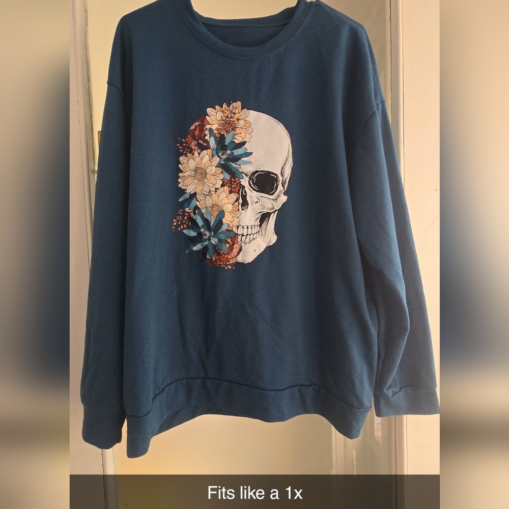 Womens Blue Skull Graphic Sweater